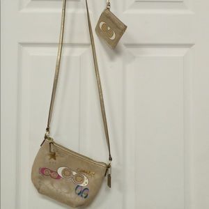 Both coach crossbody and wristlet